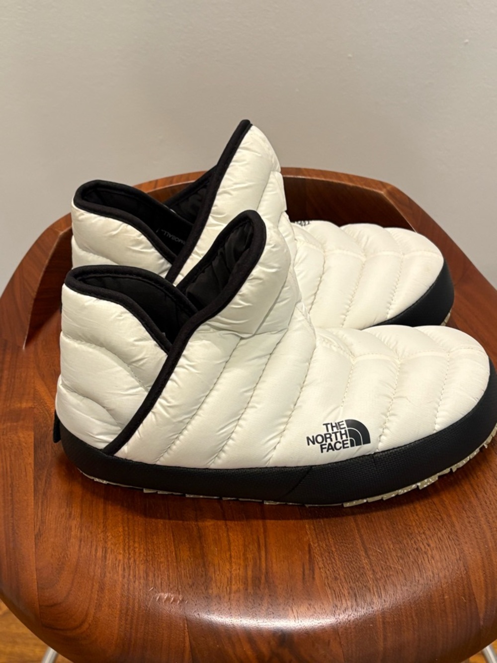 The North Face Quilted Slip-On Mules in White with Black Trim